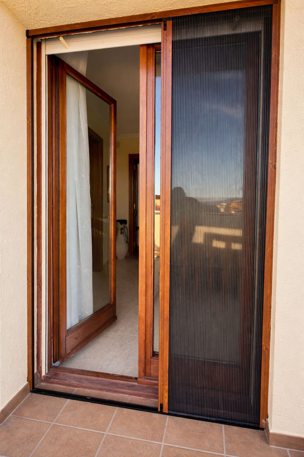 Instalación mosquitera corredera plisada